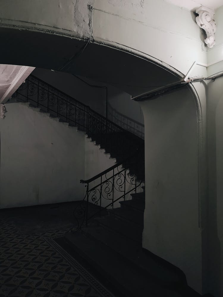 Interior Of An Abandoned House With Carved Details On The Walls 