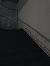 Grayscale Photo of a Concrete Staircase