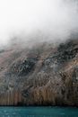 Brown and Gray Mountain Under White Clouds