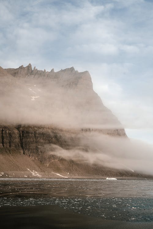 Gratis Fotos de stock gratuitas de acantilado, mar, neblina Foto de stock
