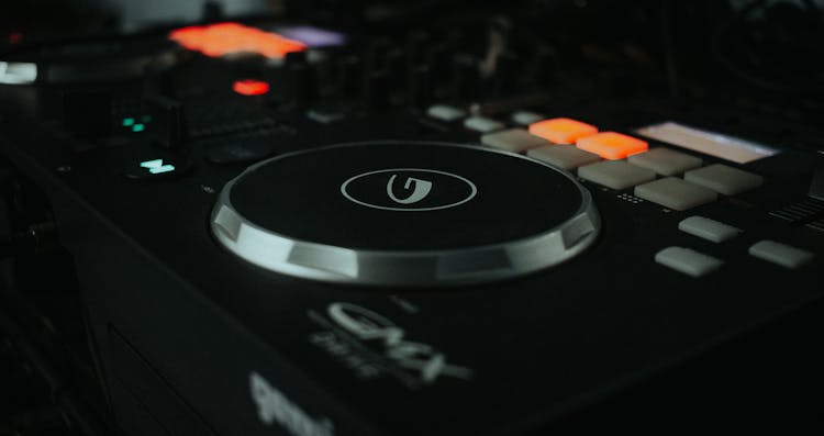 Close-up Of A DJ Mixing Board 