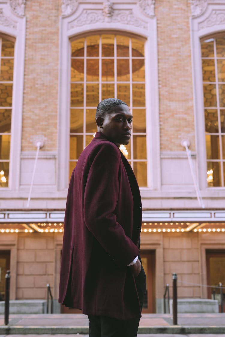 Stylish Black Businessman Near Old City Building