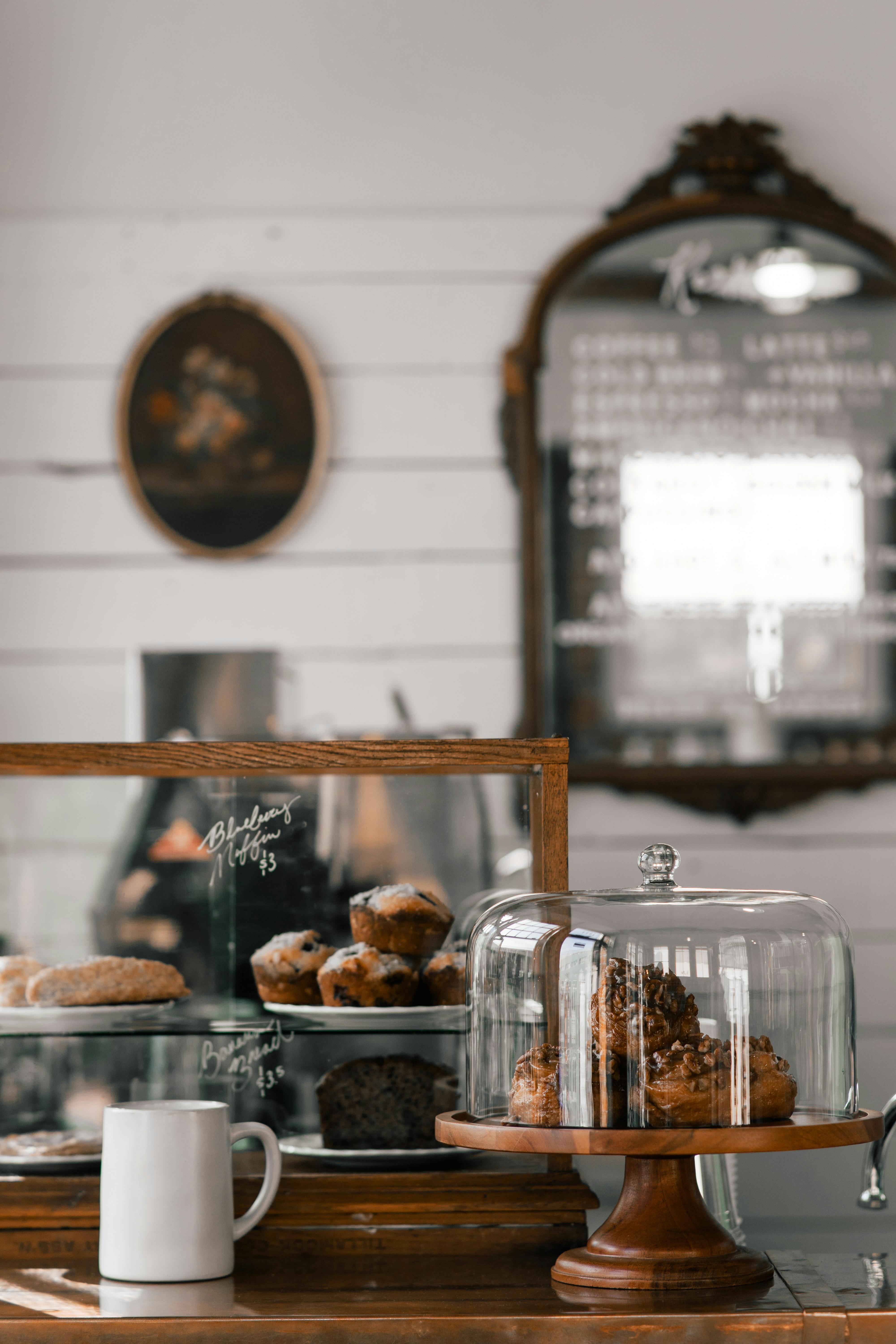 delicious pastries near mug in local bakery