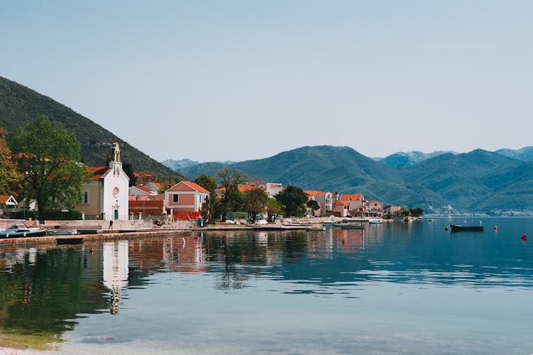 Coastal Village On Peaceful Hilly Lake Shore