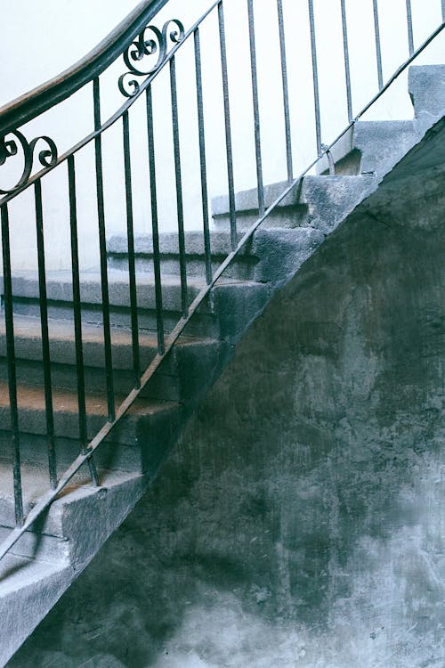 Staircase with railings in shabby porch