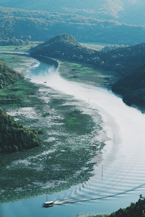 River valley between green mountains