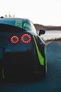 Sport car with red tail light on bumper