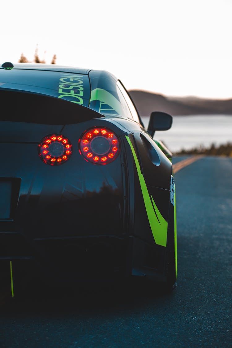 Sport Car With Red Tail Light On Bumper