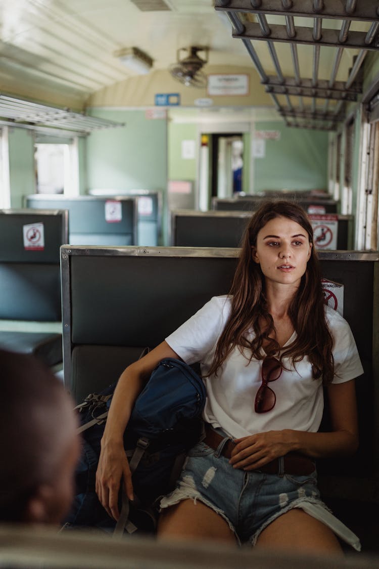 Woman Sitting On A Train