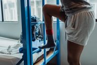 Woman in Gray Shirt and Pink Shorts Wearing Pink Socks