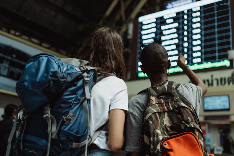 Women Looking At An Information Board