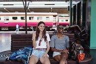 Man and Woman Sitting on Bench