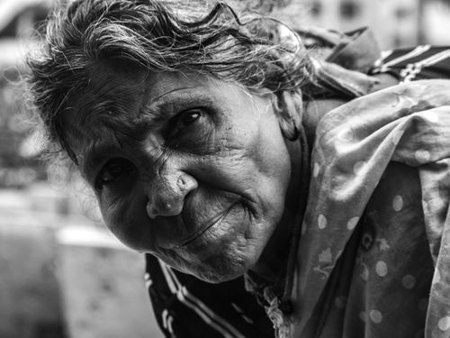 Free Engaging black and white portrait capturing the essence of wisdom and experience in an elderly woman. Stock Photo
