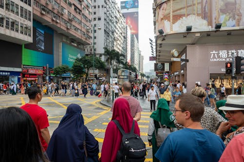 People on the Street Crossing on Pedestrian Lane