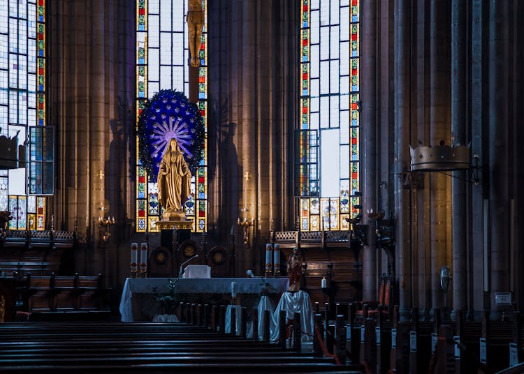 Brown Wooden Bench Inside Cathedral