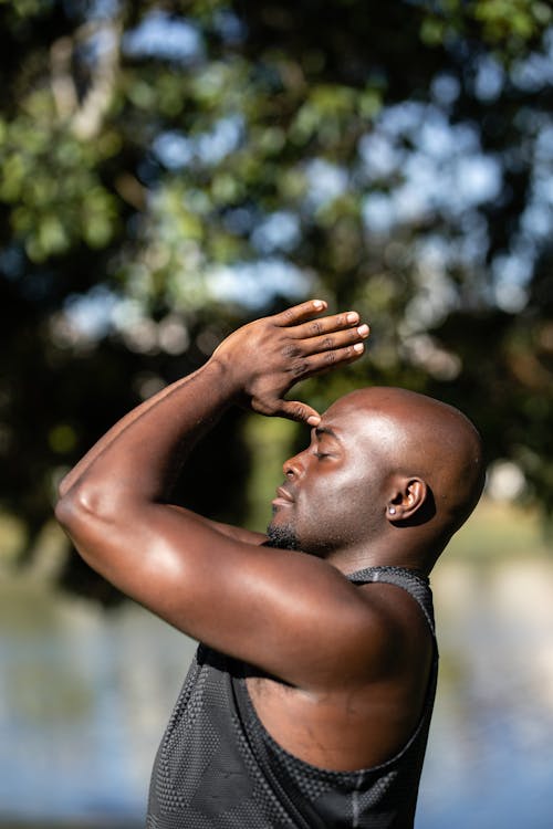Photo of a Bald Man Meditating