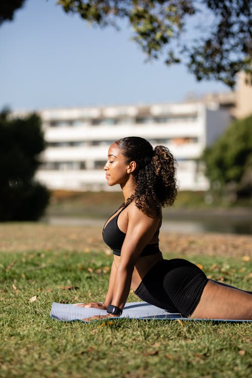 Person in Black Activewear Exercising