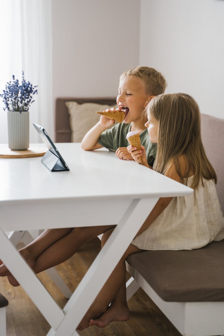 Boy And Girl Eating Ice Cream