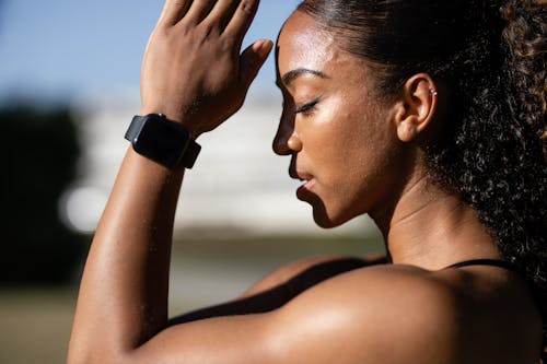 Woman Wearing Black Smartwatch Meditating