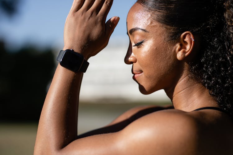 Woman Wearing Black Smartwatch Meditating