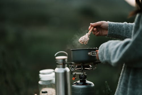 Free A Person Cooking Oatmeal Stock Photo