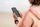 person looking at phone