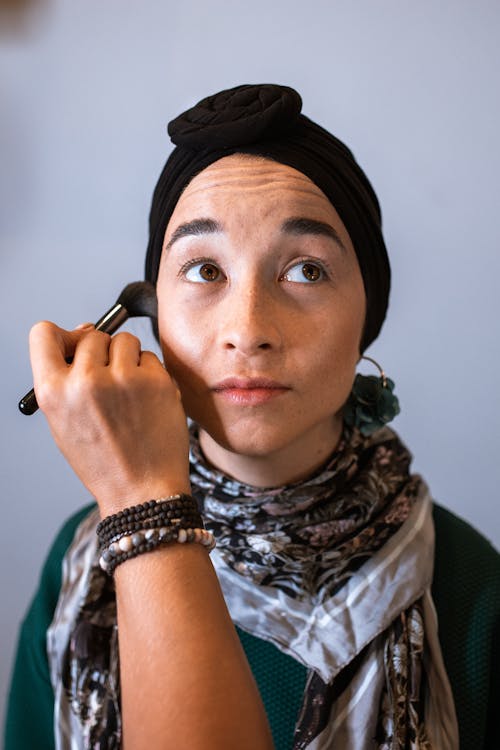 A Woman Having a Makeup