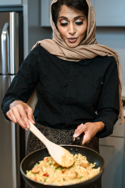 A Woman Cooking Fried Rice