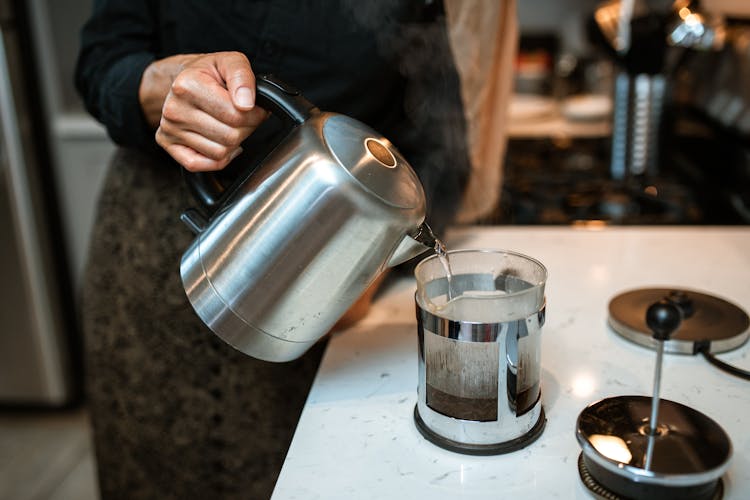 A Person Brewing Tea