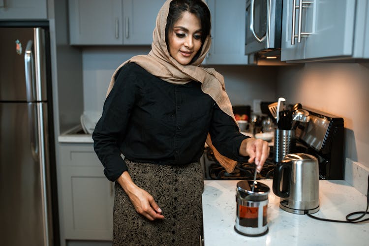 
A Woman Brewing Tea