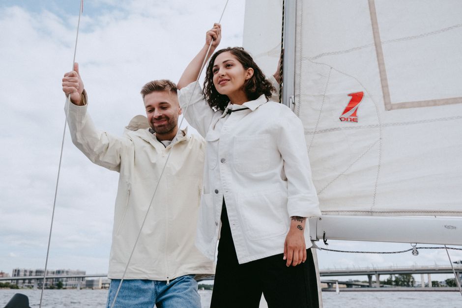 Outstanding New York City Fall Foliage Brunch Cruise Review: A Stunning Autumn Experience on the Hudson Review 2026 - Smiling couple enjoying a relaxing sailing trip on a beautiful summer day.