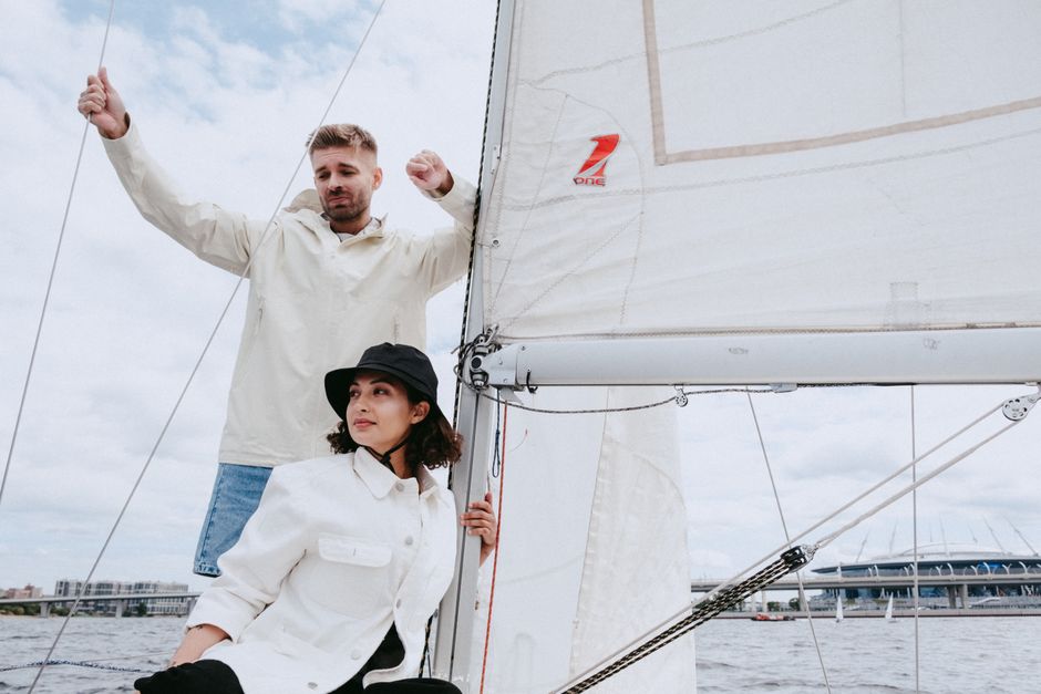 Ultimate Private Miami Captained Yacht Rental: Sunset Options Review 2026 - A couple navigating a yacht on a romantic sailing trip on the ocean.