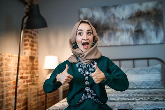A Woman with Her Thumbs Up