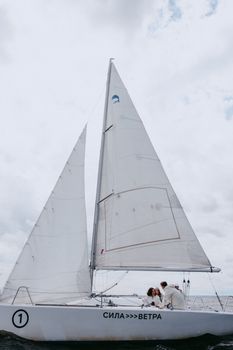 White Sail Boat on Water