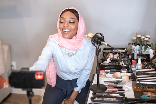 Female Vlogger in Pink Hijab doing a Video Vlog 