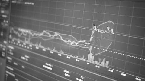 Black and white display of financial chart with data and statistics for trading analysis.