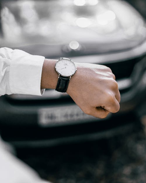Free A Person Wearing a Watch Stock Photo