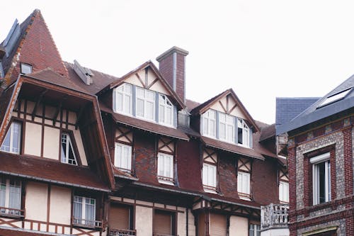 Fragment of residential building with roof