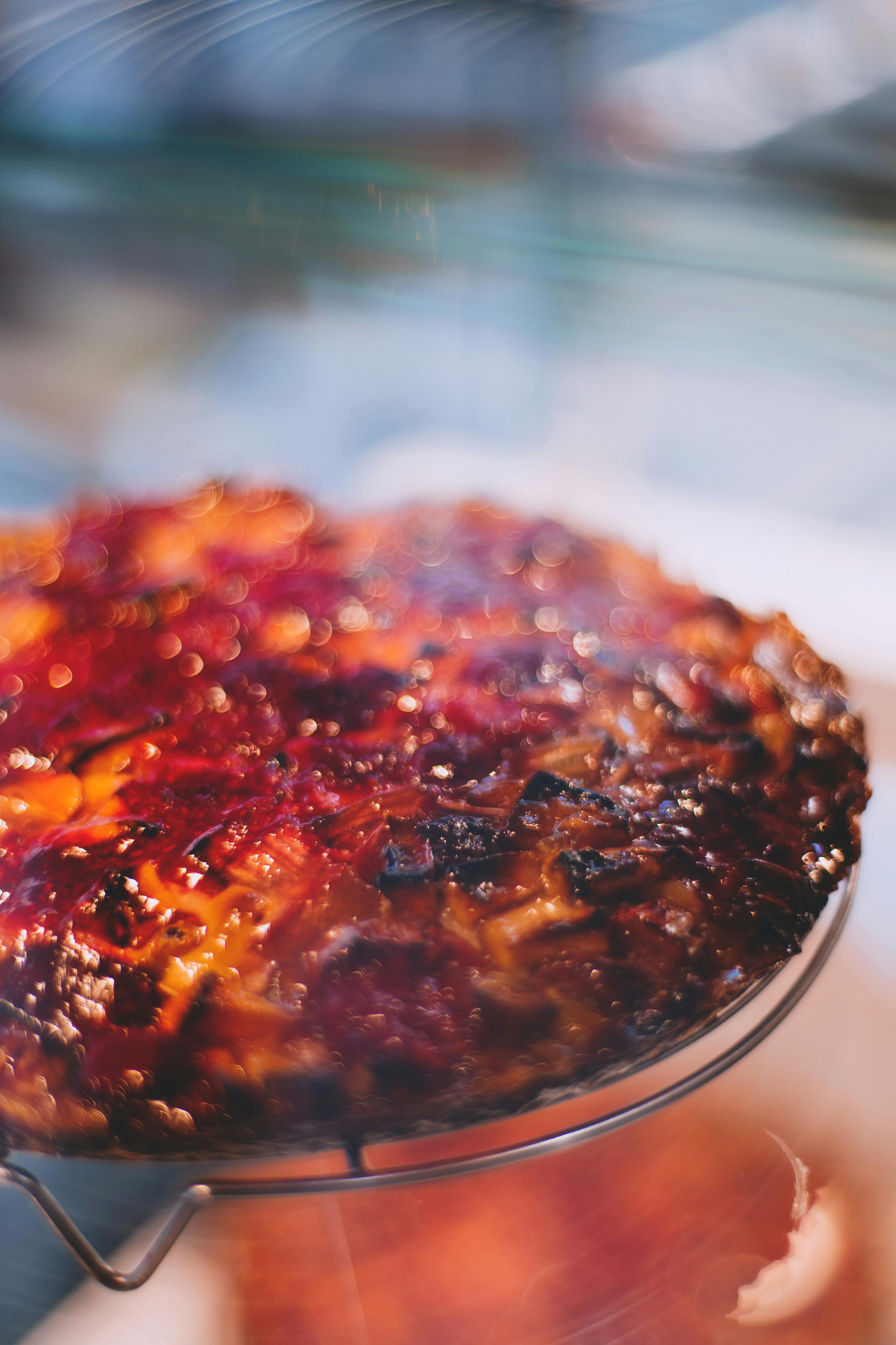 bright tasty pie on cooling rack in daytime