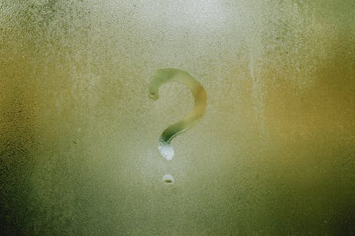 Free Misted Window with Question Mark Stock Photo