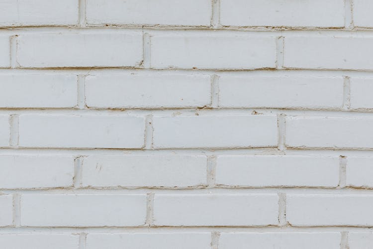 White Brick Wall Of Stone Building