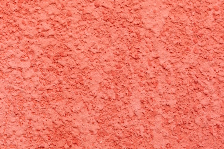 Coral Stucco Background Of Bright Wall