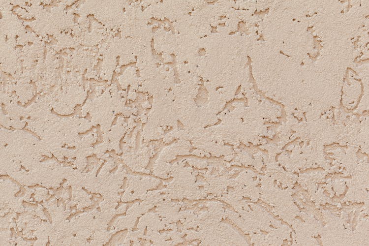 Beige Colored Stucco Surface Of Wall