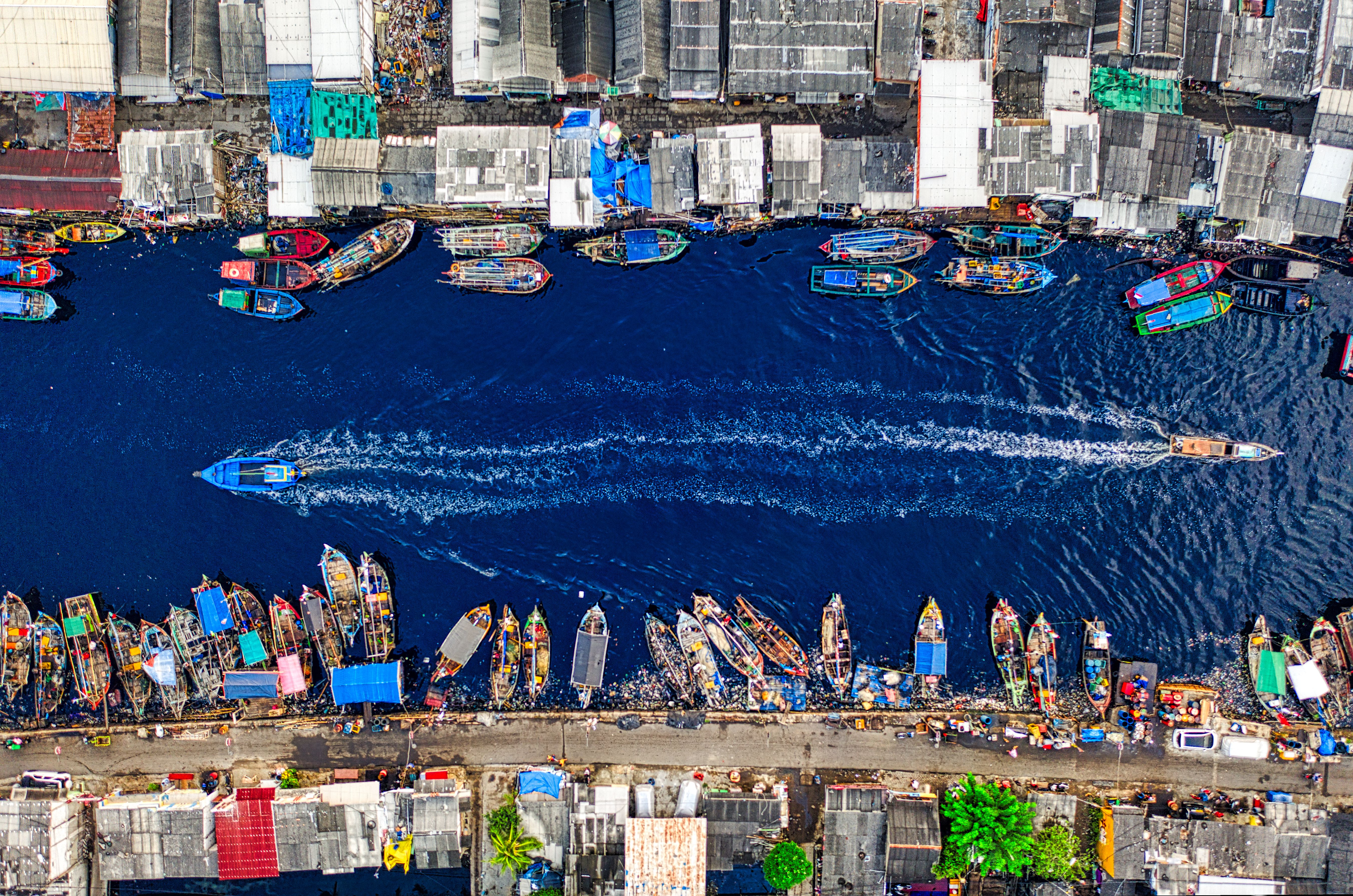 Aerial Footage of Docked Boats by the Riverside · Free Stock Photo