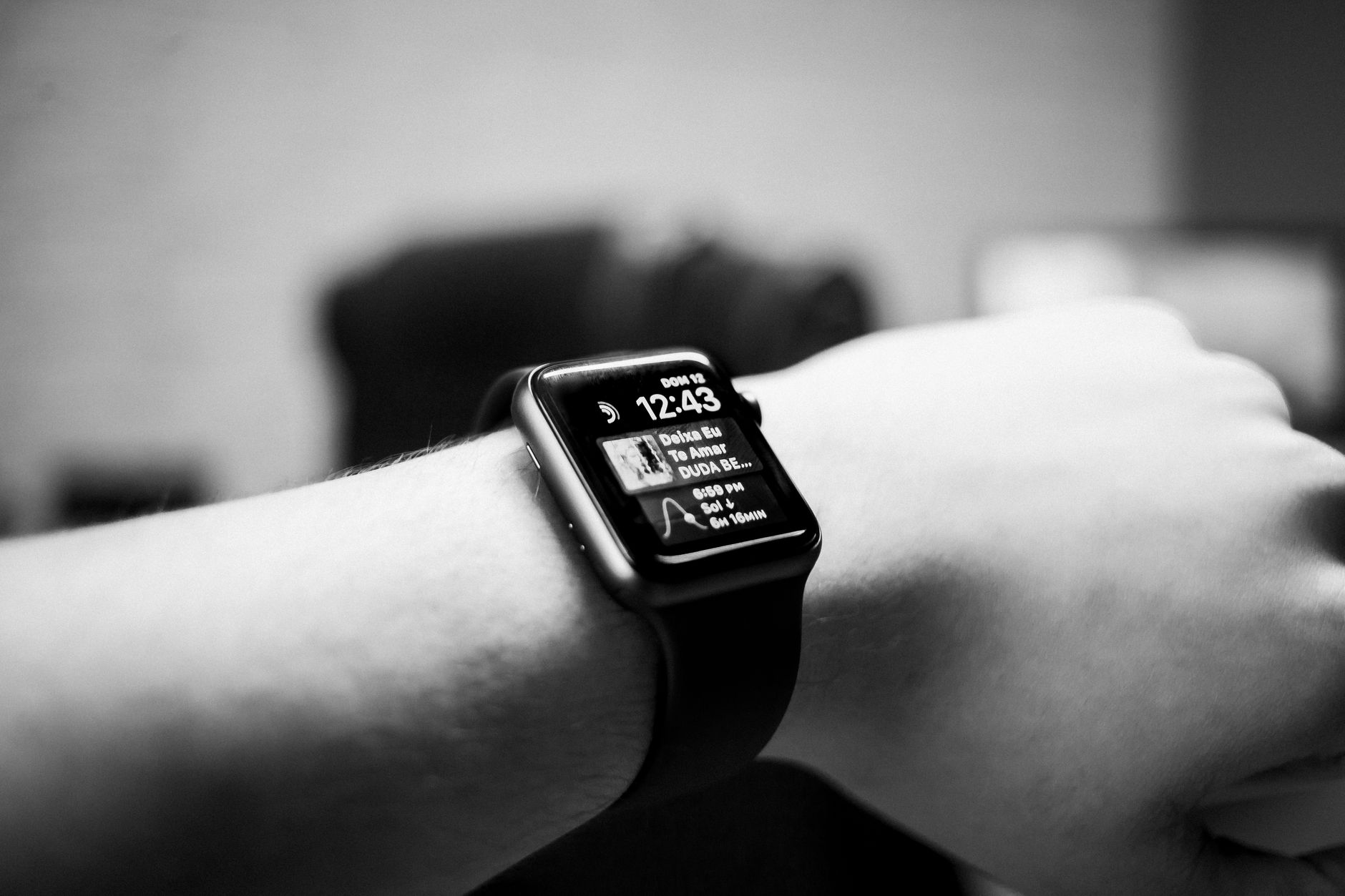 Fix a Smartwatch Not Receiving Phone Notifications (Android and iOS) Black and white close-up of a smartwatch displaying notifications on a wrist.