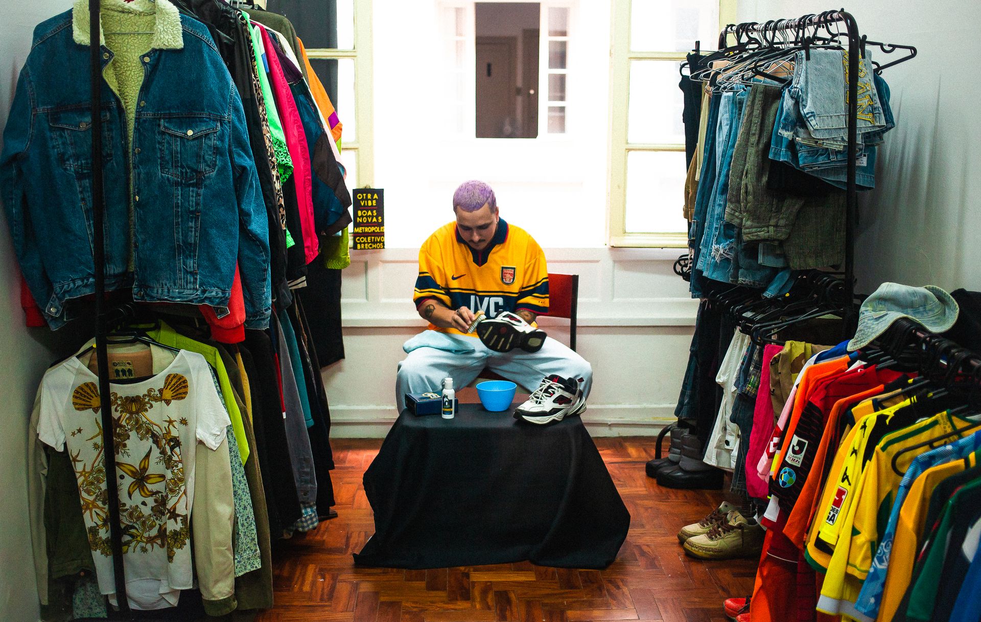 A Man Cleaning Shoes