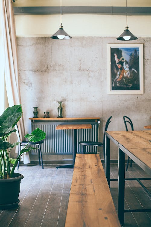 Free Interior of modern cafe with tables and chairs Stock Photo