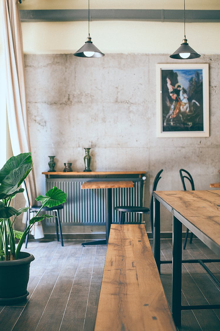 Interior Of Modern Cafe With Tables And Chairs