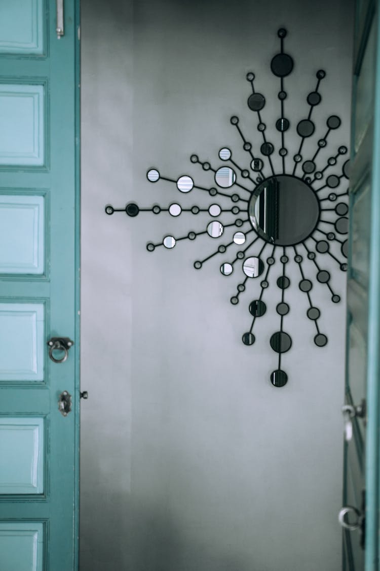 Decorative Mirror On Wall Near Door At Home