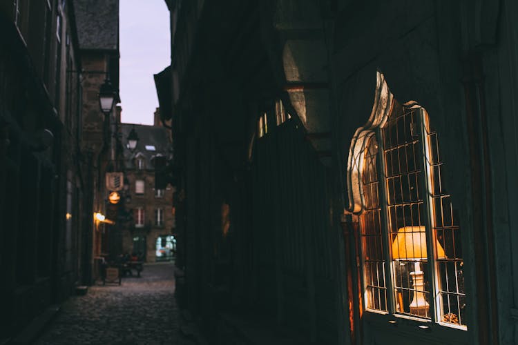 Narrow Street With Residential Houses In Late Evening